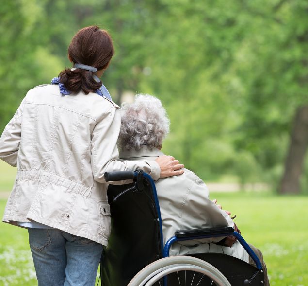 RN overseeing care plans with compassionate staff