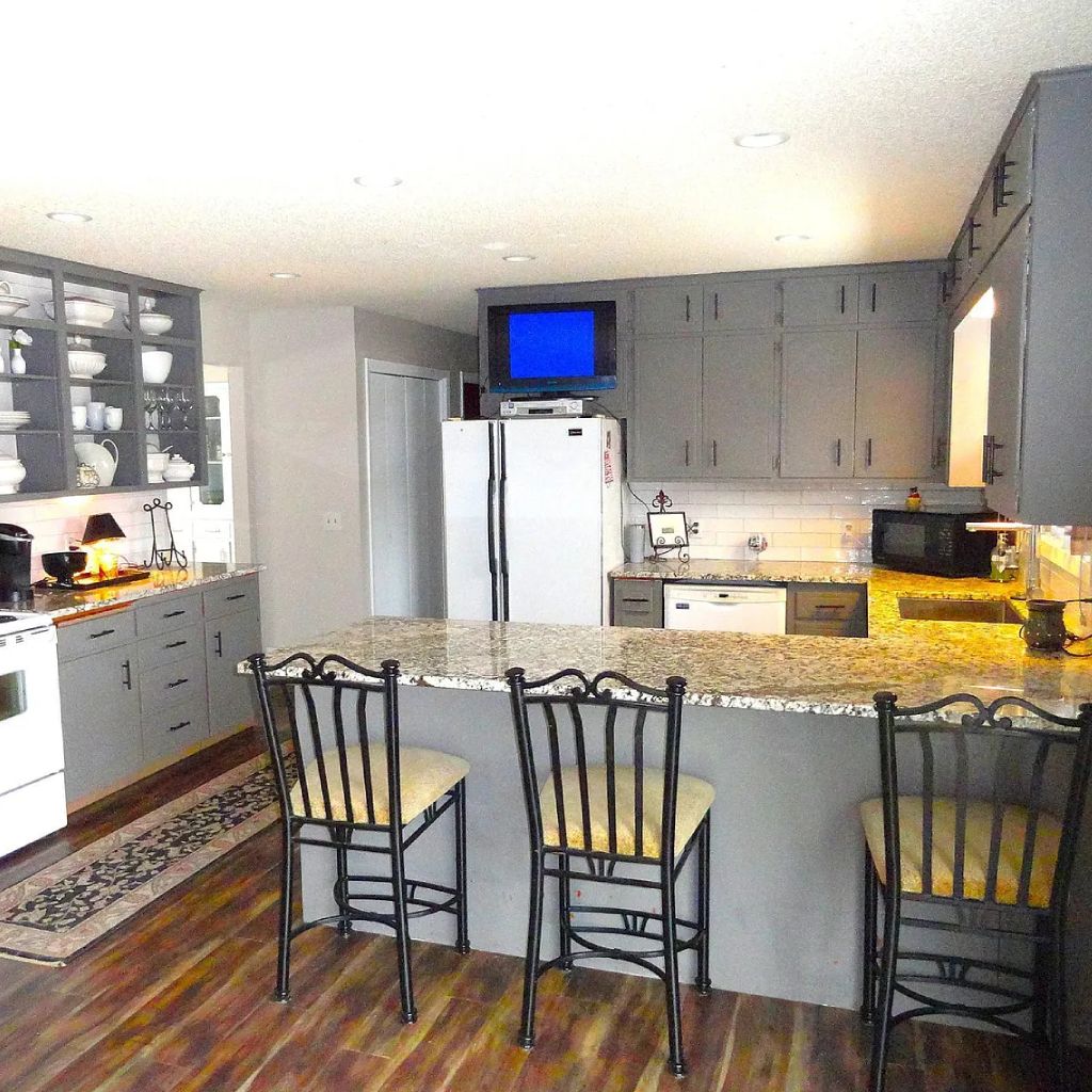 Close-up of a diverse chef preparing a beautiful, healthy, home-style meal in a clean kitchen.
